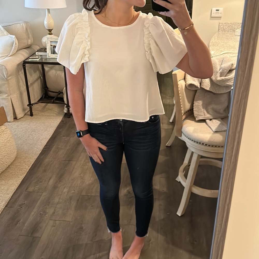 Ha Ha white ruffled top. Size large